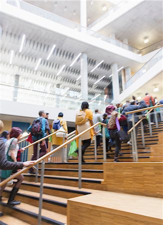 Business people ascending stairs Stock Photo - Premium Royalty-Free, Code: 6113-09157532