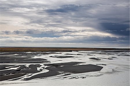 simsearch:6113-07160360,k - Clouds over low ocean tide, Stokksnes, Iceland Photographie de stock - Premium Libres de Droits, Code: 6113-09157757