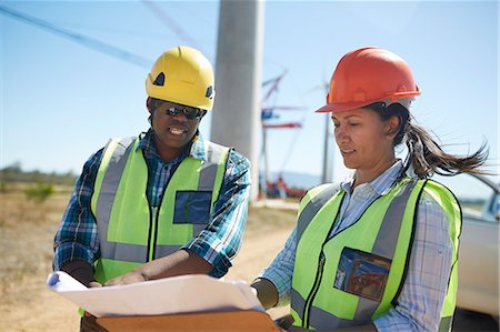 power plant technician - Engineers reviewing blueprints at power plant Stock Photo - Premium Royalty-Free, Code: 6113-09157779