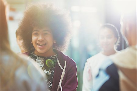 simsearch:6113-09168289,k - Smiling, confident teenage boy with friends Stock Photo - Premium Royalty-Free, Code: 6113-09157894