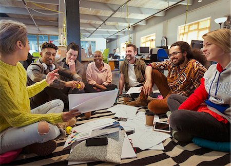 simsearch:6113-07565892,k - Creative business team meeting, brainstorming in circle on floor Stock Photo - Premium Royalty-Free, Code: 6113-09159972