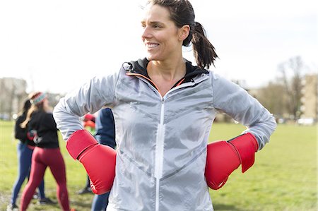 simsearch:649-05648783,k - Portrait confident woman boxing in park Stock Photo - Premium Royalty-Free, Code: 6113-09160082