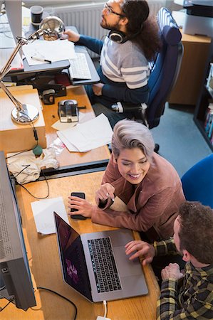 Creative business people meeting, working at laptop in office Photographie de stock - Premium Libres de Droits, Code: 6113-09160004