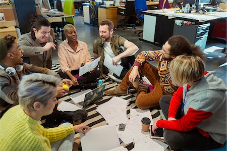 simsearch:6113-07565852,k - Creative business team meeting, brainstorming circle on office floor Stock Photo - Premium Royalty-Free, Code: 6113-09160038