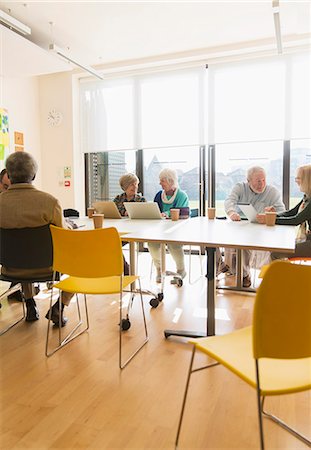 Senior business people in conference room meeting Stock Photo - Premium Royalty-Free, Code: 6113-09160299