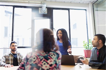 simsearch:614-06814114,k - Creative businesswoman leading conference room meeting Photographie de stock - Premium Libres de Droits, Code: 6113-09168777