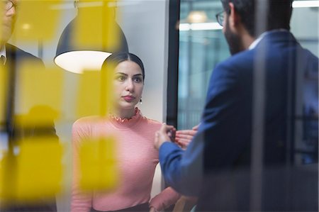 discussion office sticky note - Business people talking in meeting Stock Photo - Premium Royalty-Free, Code: 6113-09168701