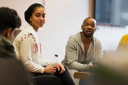 dangling teenage - Teenagers and teacher talking in community center Stock Photo - Premium Royalty-Free, Code: 6113-09178546