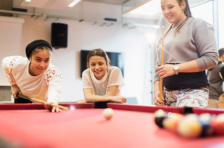 dangling teenage - Teenagers playing pool in community center Stock Photo - Premium Royalty-Free, Code: 6113-09178560