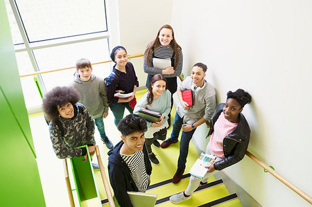 Portrait confident high school students on stair landing Photographie de stock - Premium Libres de Droits, Code: 6113-09178580