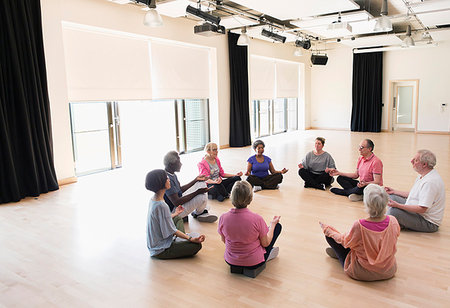 senior community living centers - Serene active seniors meditating in circle Stock Photo - Premium Royalty-Free, Code: 6113-09178651