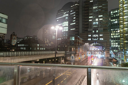 elevated pedestrian walkways - View of rain falling over city at night Stock Photo - Premium Royalty-Free, Code: 6113-09178798