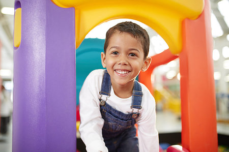 simsearch:614-05523145,k - Portrait cute boy playing on slide Stock Photo - Premium Royalty-Free, Code: 6113-09178914
