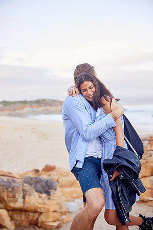 simsearch:6108-06905483,k - Affectionate couple hugging at beach Stock Photo - Premium Royalty-Free, Code: 6113-09192074