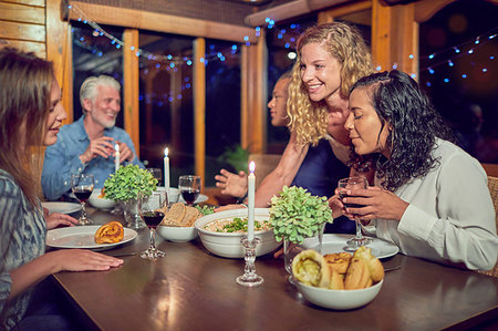 Friends enjoying dinner in cabin Stock Photo - Premium Royalty-Free, Code: 6113-09192083