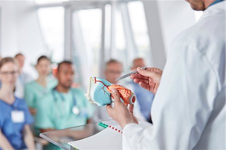 simsearch:6113-09111915,k - Surgeon leading conference Stock Photo - Premium Royalty-Free, Code: 6113-09111903