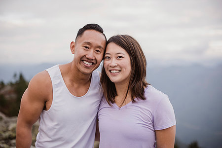 portrait hiker minority millenial - Portrait happy couple hiking Stock Photo - Premium Royalty-Free, Code: 6113-09240847