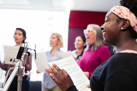 simsearch:6113-09168289,k - Womens choir with sheet music singing in music recording studio Stock Photo - Premium Royalty-Free, Code: 6113-09240882