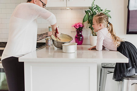 simsearch:6113-08928024,k - Curious girl watching mother baking in kitchen Stock Photo - Premium Royalty-Free, Code: 6113-09240817