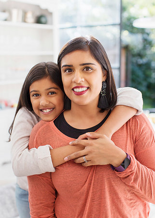 simsearch:6124-09178067,k - Portrait happy mother and daughter hugging Stock Photo - Premium Royalty-Free, Code: 6113-09241135