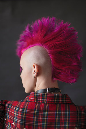 Cool young woman with pink mohawk Stock Photo - Premium Royalty-Free, Code: 6113-09200040