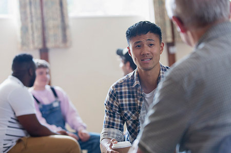 simsearch:6113-09220733,k - Men talking in group therapy Stock Photo - Premium Royalty-Free, Code: 6113-09220746