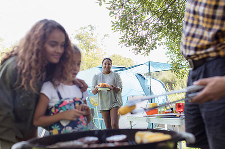 simsearch:6124-09269943,k - Family barbecuing at campsite Stock Photo - Premium Royalty-Free, Code: 6113-09239946