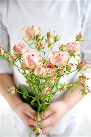 rose - Child Holding Bunch Of Flowers, Munich, Bavaria, Germany, Europe Stock Photo - Premium Royalty-Free, Code: 6115-06778498