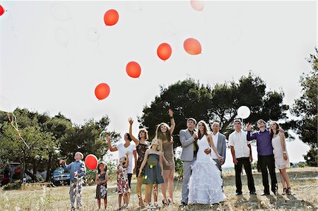 simsearch:6115-06778587,k - Wedding Guests With Balloons, Croatia, Dalmatia Foto de stock - Royalty Free Premium, Número: 6115-06778584