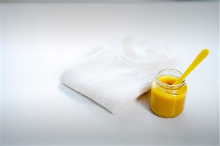 Baby Food And Baby Bib, Munich,  Bavaria, Germany Stock Photo - Premium Royalty-Free, Code: 6115-06778534