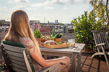 roof terrace - Woman On Balcony, Munich, Bavaria, Germany, Europe Stock Photo - Premium Royalty-Free, Code: 6115-06778659