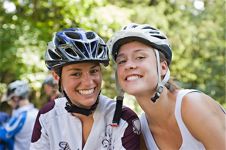 simsearch:6115-06778865,k - Two Teenage Girls Wearing Bicycle Helmets, Sonthofen, Schattwald, Bavaria, Germany Stock Photo - Premium Royalty-Free, Code: 6115-06778865