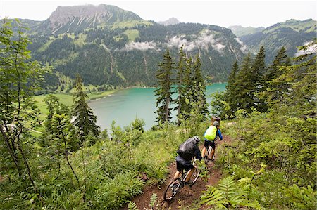 simsearch:6115-06778865,k - Two Mountain Bikers, Schattwald, Bavaria, Germany Stock Photo - Premium Royalty-Free, Code: 6115-06778871