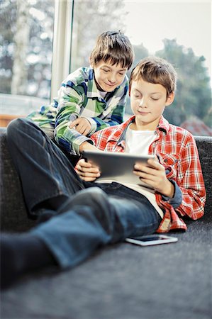 e-learning - Two boys using digital tablet, Osijek, Croatia, Europe Stock Photo - Premium Royalty-Free, Code: 6115-06779039
