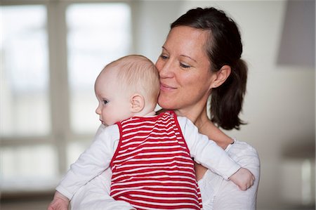 simsearch:6115-06778865,k - Young mother with baby girl, Munich, Bavaria, Germany Stock Photo - Premium Royalty-Free, Code: 6115-06779101