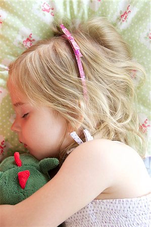 simsearch:6115-07109681,k - Little Girl Taking A Nap Stock Photo - Premium Royalty-Free, Code: 6115-06732787