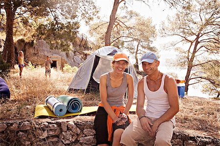 father son camping woods - Croatia, Dalmatia, Couple on camping site, portrait Stock Photo - Premium Royalty-Free, Code: 6115-06732822