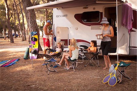 parent cooking girl father - Croatia, Dalmatia, Family Holidays on Camp Site Stock Photo - Premium Royalty-Free, Code: 6115-06732837