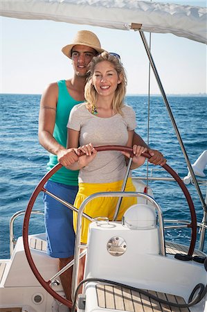 Croatia, Adriatic Sea, Young couple on sailboat Stock Photo - Premium Royalty-Free, Code: 6115-06733136