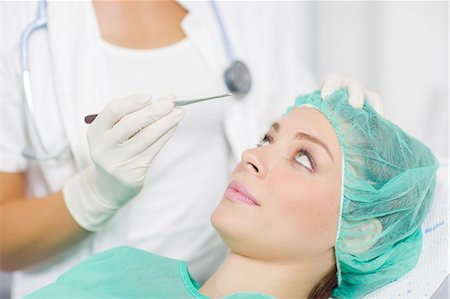 simsearch:632-07539926,k - Patient Getting A Cosmetic Surgery Treatment Stock Photo - Premium Royalty-Free, Code: 6115-06733252