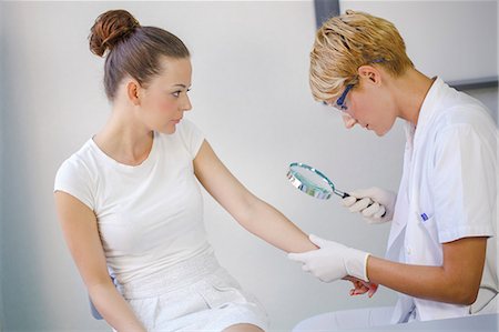 female doctor glove women only - Dermatology, Patient in Treatment Stock Photo - Premium Royalty-Free, Code: 6115-06733207