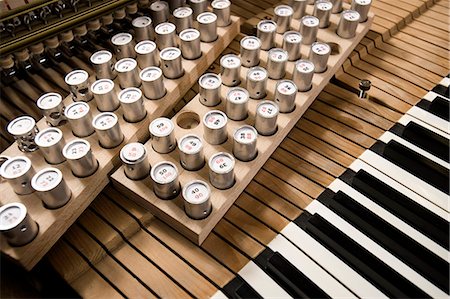 Piano keys and weights, Regensburg, Bavaria, Germany Stock Photo - Premium Royalty-Free, Code: 6115-06967078