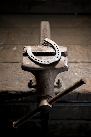 schmied - Horseshoe on vise grip, Landshut, Bavaria, Germany Stockbilder - Premium RF Lizenzfrei, Bildnummer: 6115-06967111