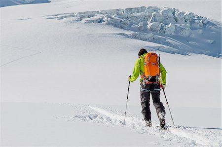 simsearch:6115-06967096,k - Back country skier ploughing through snow, European Alps, Tyrol, Austria Stock Photo - Premium Royalty-Free, Code: 6115-07109737