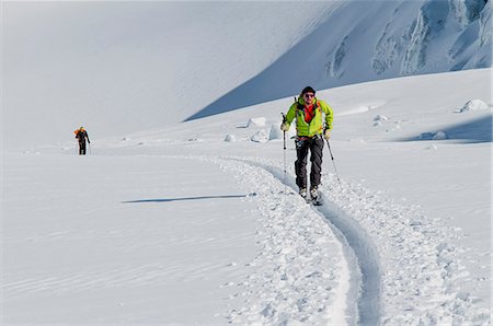 Two back country skiers ploughing through snow, European Alps, Tyrol, Austria Stockbilder - Premium RF Lizenzfrei, Bildnummer: 6115-07109738