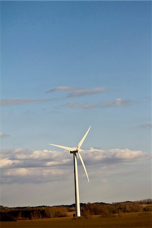 Single wind turbine in a field, Denmark, Europe Stock Photo - Premium Royalty-Free, Code: 6115-07109812