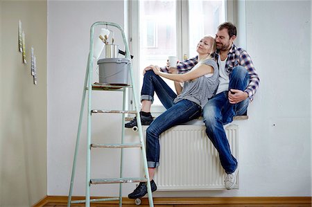 simsearch:6115-08416163,k - Home improvement, happy couple taking a break, Munich, Bavaria, Germany Stock Photo - Premium Royalty-Free, Code: 6115-07282820