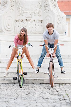 simsearch:6115-08105110,k - Young couple with bicycles, having fun, Osijek, Croatia Stock Photo - Premium Royalty-Free, Code: 6115-07282904