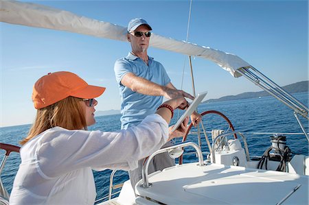 Mature couple sailing together, Adriatic Sea, Croatia Stock Photo - Premium Royalty-Free, Code: 6115-07539696