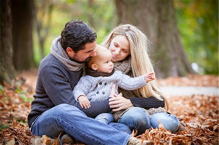 simsearch:632-01147960,k - Family with son sits among autumn leaves, Osijek, Croatia Stock Photo - Premium Royalty-Free, Code: 6115-07539770